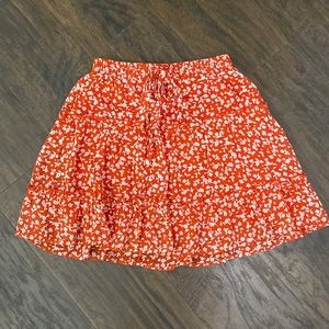 Floral coral skirt in size S